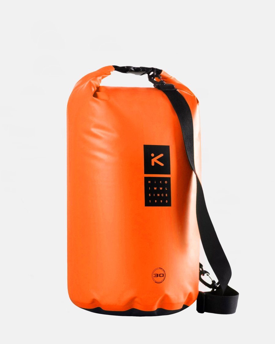 ORANGE DRY BAG WITH BLACK LOGO ON A WHITE BACKGROUND