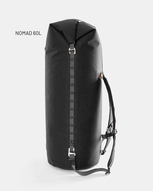 SIDE VIEW OF NOMAD 80L DRY BACKPACK 