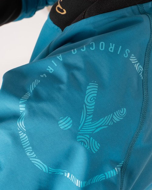 close up view of Hiko Sirocco sleeve in sherpa blue with logo